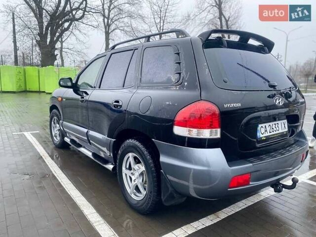 Чорний Хендай Санта Фе, об'ємом двигуна 1.99 л та пробігом 360 тис. км за 6400 $, фото 5 на Automoto.ua