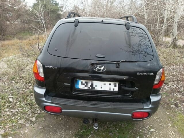 Чорний Хендай Санта Фе, об'ємом двигуна 2 л та пробігом 258 тис. км за 3000 $, фото 2 на Automoto.ua