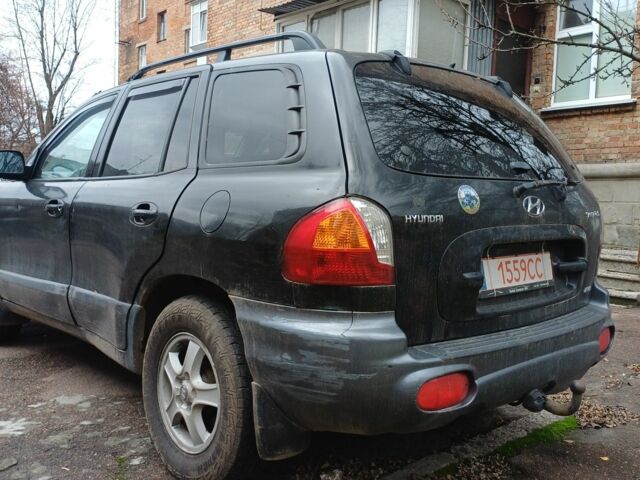 Черный Хендай Санта Фе, объемом двигателя 0 л и пробегом 230 тыс. км за 4866 $, фото 1 на Automoto.ua