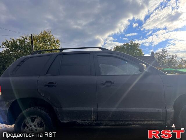 Черный Хендай Санта Фе, объемом двигателя 2 л и пробегом 38 тыс. км за 4000 $, фото 1 на Automoto.ua