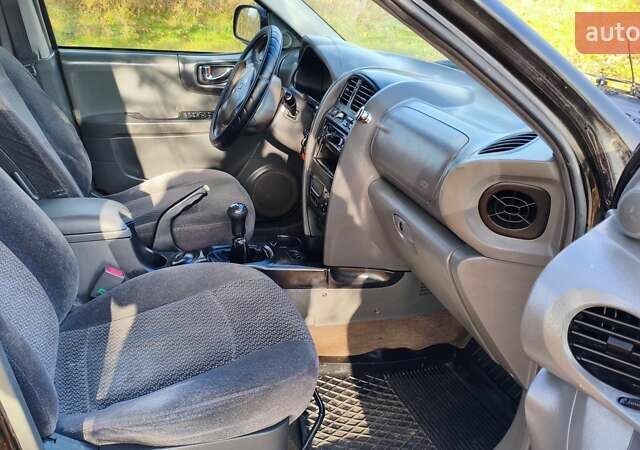 Чорний Хендай Санта Фе, об'ємом двигуна 2 л та пробігом 306 тис. км за 4199 $, фото 13 на Automoto.ua