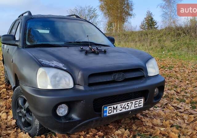 Чорний Хендай Санта Фе, об'ємом двигуна 2 л та пробігом 306 тис. км за 4199 $, фото 4 на Automoto.ua