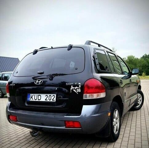 Черный Хендай Санта Фе, объемом двигателя 2.2 л и пробегом 244 тыс. км за 2200 $, фото 6 на Automoto.ua