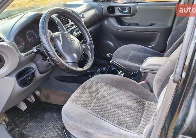 Чорний Хендай Санта Фе, об'ємом двигуна 2 л та пробігом 306 тис. км за 4199 $, фото 15 на Automoto.ua