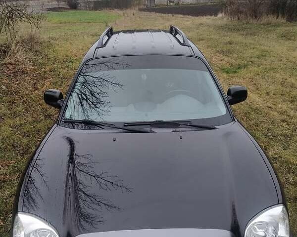 Чорний Хендай Санта Фе, об'ємом двигуна 2 л та пробігом 203 тис. км за 7100 $, фото 9 на Automoto.ua