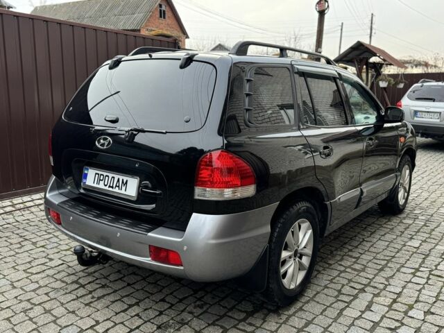 Чорний Хендай Санта Фе, об'ємом двигуна 2.35 л та пробігом 186 тис. км за 6000 $, фото 2 на Automoto.ua