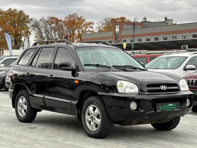Чорний Хендай Санта Фе, об'ємом двигуна 2.7 л та пробігом 231 тис. км за 6490 $, фото 5 на Automoto.ua