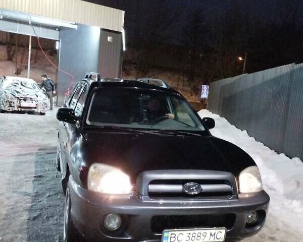 Черный Хендай Санта Фе, объемом двигателя 2 л и пробегом 194 тыс. км за 7500 $, фото 8 на Automoto.ua