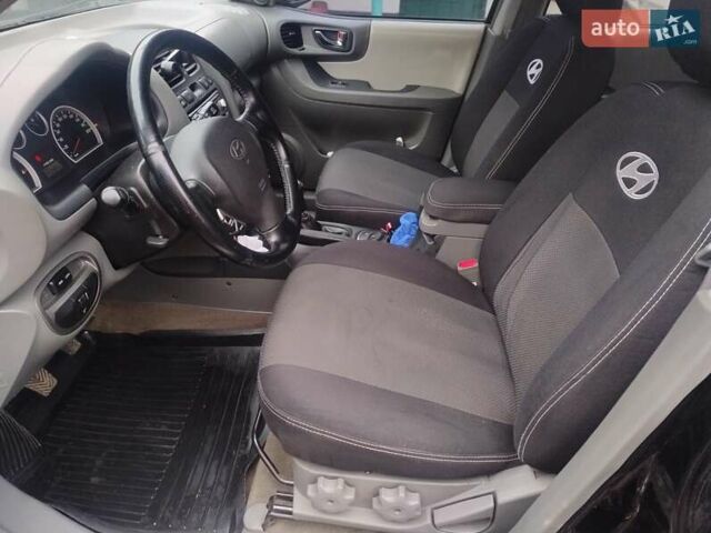 Чорний Хендай Санта Фе, об'ємом двигуна 2 л та пробігом 203 тис. км за 7100 $, фото 26 на Automoto.ua
