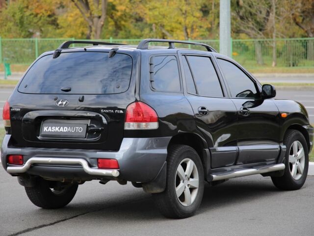 Черный Хендай Санта Фе, объемом двигателя 2 л и пробегом 222 тыс. км за 5500 $, фото 5 на Automoto.ua