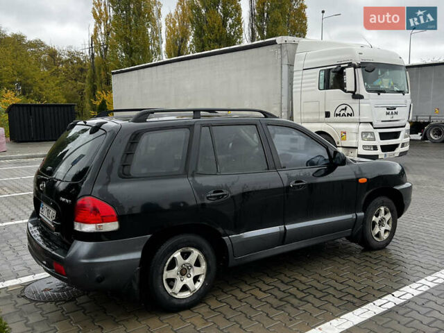 Черный Хендай Санта Фе, объемом двигателя 2 л и пробегом 270 тыс. км за 4300 $, фото 6 на Automoto.ua