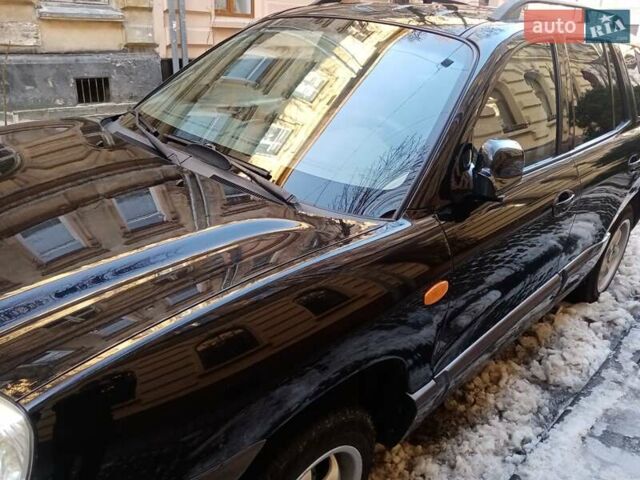 Черный Хендай Санта Фе, объемом двигателя 2 л и пробегом 194 тыс. км за 7500 $, фото 2 на Automoto.ua