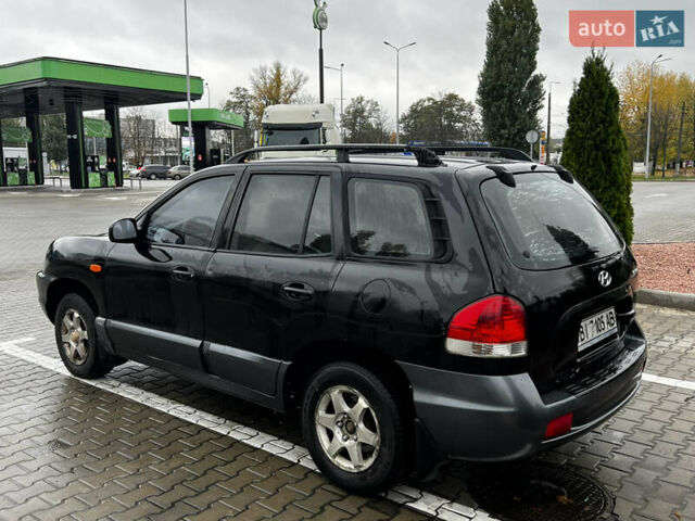 Черный Хендай Санта Фе, объемом двигателя 2 л и пробегом 270 тыс. км за 4300 $, фото 7 на Automoto.ua