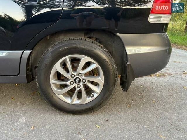 Черный Хендай Санта Фе, объемом двигателя 2.4 л и пробегом 175 тыс. км за 6800 $, фото 22 на Automoto.ua