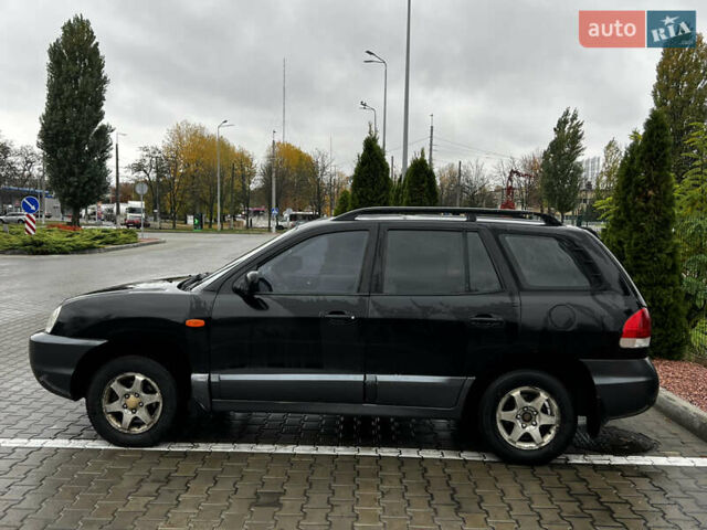 Черный Хендай Санта Фе, объемом двигателя 2 л и пробегом 270 тыс. км за 4300 $, фото 8 на Automoto.ua