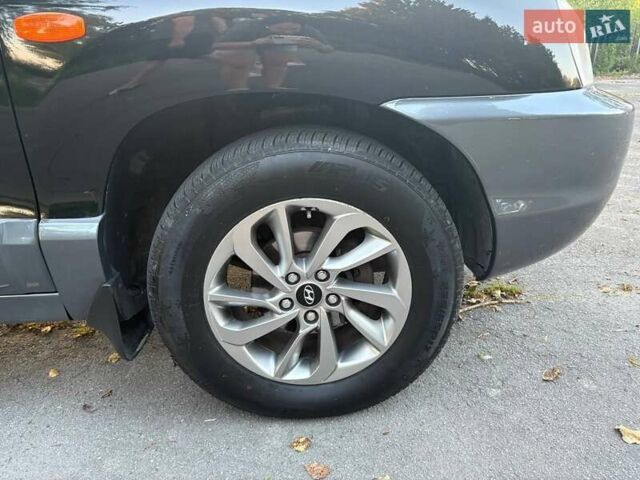 Черный Хендай Санта Фе, объемом двигателя 2.4 л и пробегом 175 тыс. км за 6800 $, фото 21 на Automoto.ua