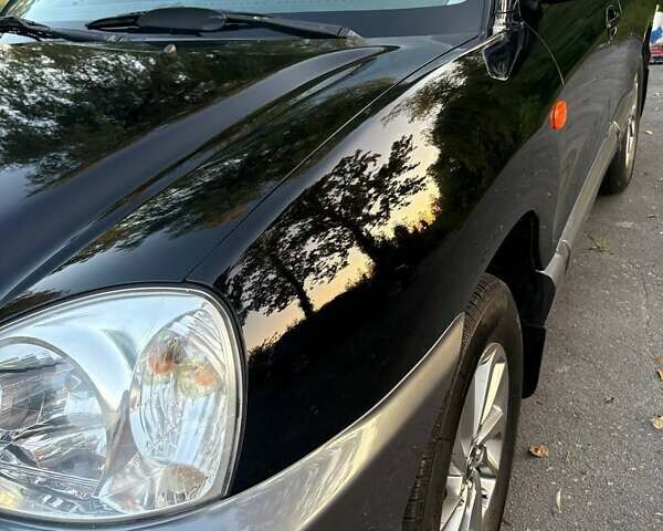 Черный Хендай Санта Фе, объемом двигателя 2.4 л и пробегом 175 тыс. км за 6800 $, фото 14 на Automoto.ua