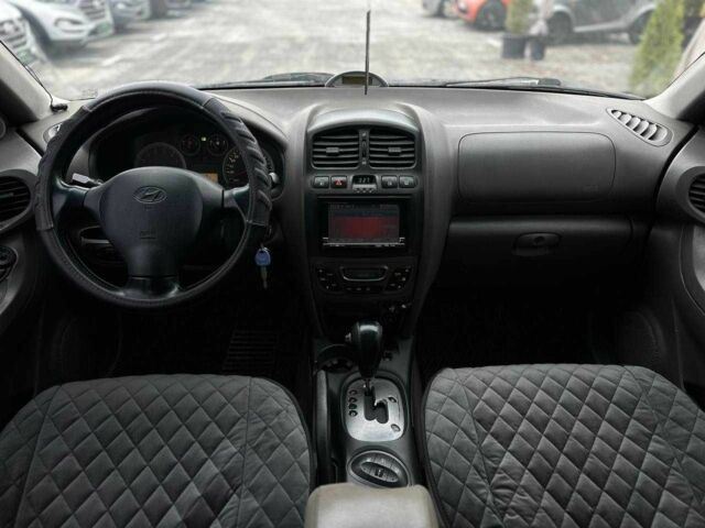 Чорний Хендай Санта Фе, об'ємом двигуна 2.7 л та пробігом 231 тис. км за 6490 $, фото 15 на Automoto.ua