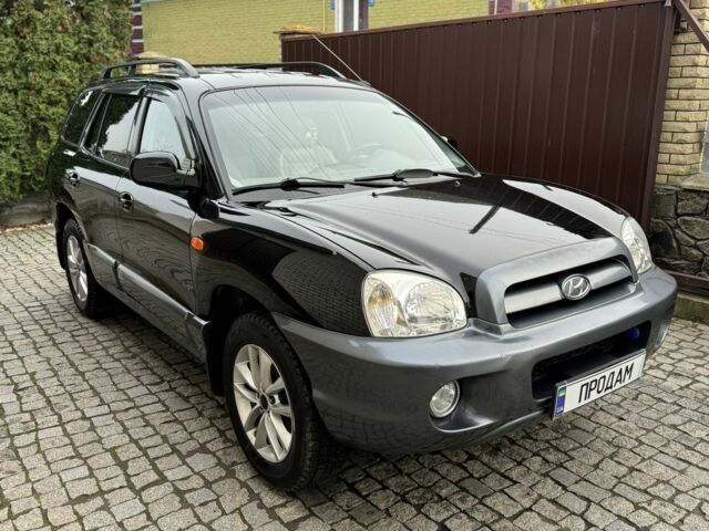 Чорний Хендай Санта Фе, об'ємом двигуна 2.35 л та пробігом 186 тис. км за 6000 $, фото 1 на Automoto.ua