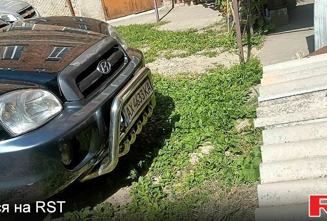 Черный Хендай Санта Фе, объемом двигателя 2 л и пробегом 200 тыс. км за 5100 $, фото 2 на Automoto.ua