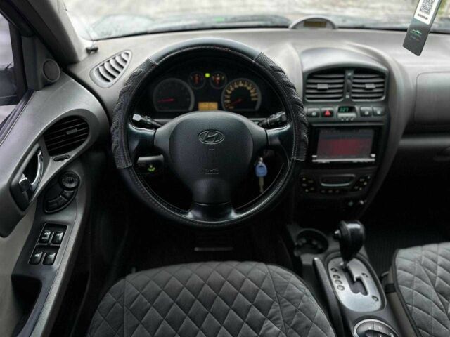 Чорний Хендай Санта Фе, об'ємом двигуна 2.7 л та пробігом 231 тис. км за 6490 $, фото 18 на Automoto.ua