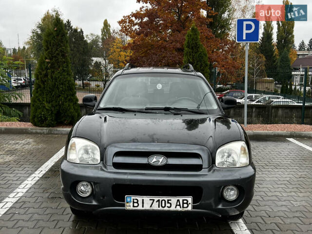 Черный Хендай Санта Фе, объемом двигателя 2 л и пробегом 270 тыс. км за 4300 $, фото 5 на Automoto.ua