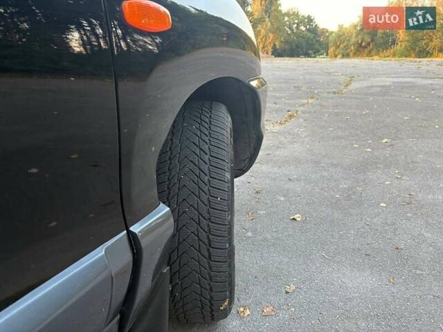 Черный Хендай Санта Фе, объемом двигателя 2.4 л и пробегом 175 тыс. км за 6800 $, фото 31 на Automoto.ua