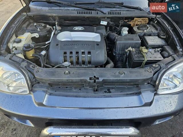 Черный Хендай Санта Фе, объемом двигателя 2 л и пробегом 225 тыс. км за 5850 $, фото 16 на Automoto.ua