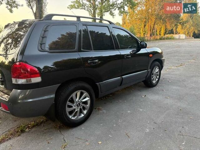Черный Хендай Санта Фе, объемом двигателя 2.4 л и пробегом 175 тыс. км за 6800 $, фото 11 на Automoto.ua
