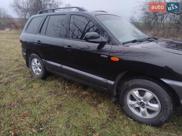 Чорний Хендай Санта Фе, об'ємом двигуна 2 л та пробігом 203 тис. км за 7100 $, фото 6 на Automoto.ua