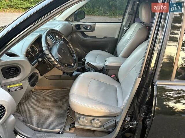 Черный Хендай Санта Фе, объемом двигателя 2.4 л и пробегом 175 тыс. км за 6800 $, фото 33 на Automoto.ua