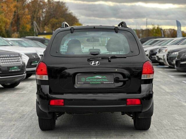 Чорний Хендай Санта Фе, об'ємом двигуна 2.7 л та пробігом 231 тис. км за 6490 $, фото 6 на Automoto.ua