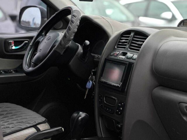 Чорний Хендай Санта Фе, об'ємом двигуна 2.7 л та пробігом 231 тис. км за 6490 $, фото 11 на Automoto.ua