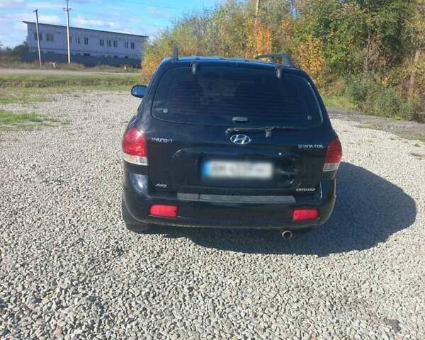 Черный Хендай Санта Фе, объемом двигателя 2.35 л и пробегом 313 тыс. км за 5500 $, фото 4 на Automoto.ua