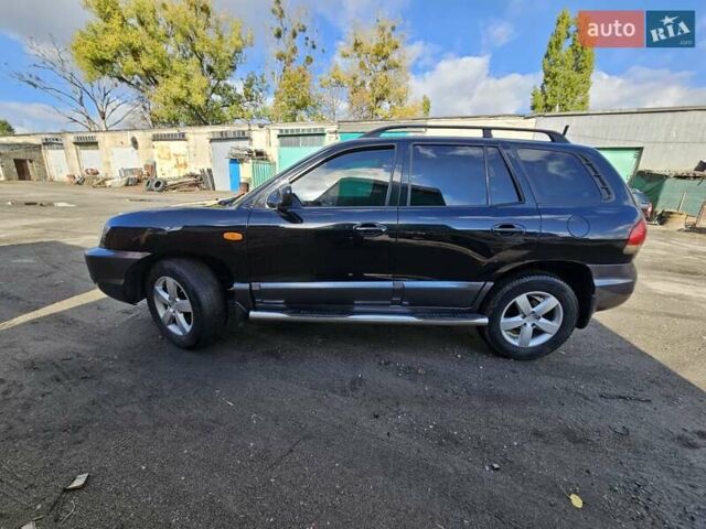 Черный Хендай Санта Фе, объемом двигателя 2 л и пробегом 225 тыс. км за 5850 $, фото 21 на Automoto.ua