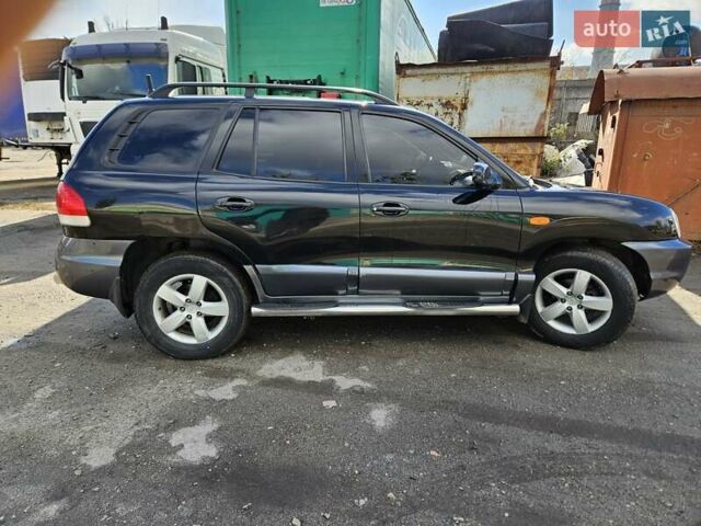 Черный Хендай Санта Фе, объемом двигателя 2 л и пробегом 225 тыс. км за 5850 $, фото 10 на Automoto.ua