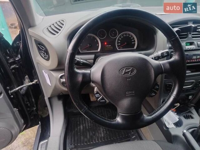 Чорний Хендай Санта Фе, об'ємом двигуна 2 л та пробігом 203 тис. км за 7100 $, фото 22 на Automoto.ua