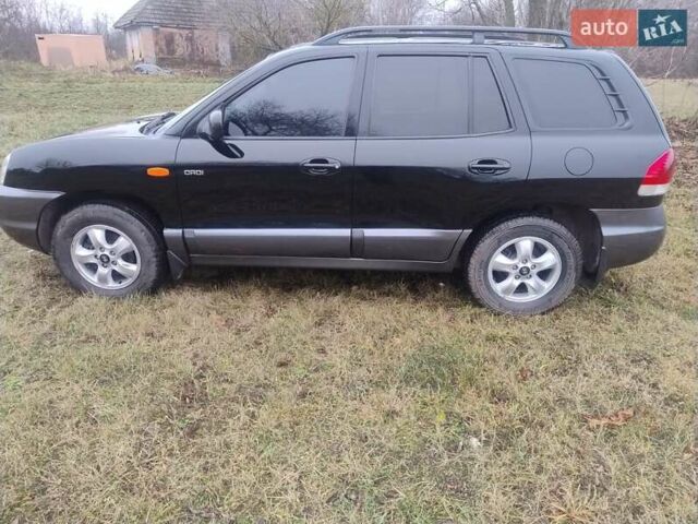 Чорний Хендай Санта Фе, об'ємом двигуна 2 л та пробігом 203 тис. км за 7100 $, фото 2 на Automoto.ua