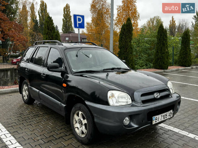 Черный Хендай Санта Фе, объемом двигателя 2 л и пробегом 270 тыс. км за 4300 $, фото 2 на Automoto.ua