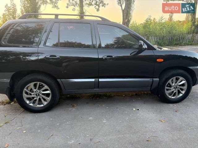 Черный Хендай Санта Фе, объемом двигателя 2.4 л и пробегом 175 тыс. км за 6800 $, фото 10 на Automoto.ua