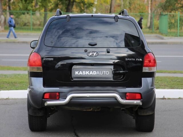 Черный Хендай Санта Фе, объемом двигателя 2 л и пробегом 222 тыс. км за 5500 $, фото 4 на Automoto.ua