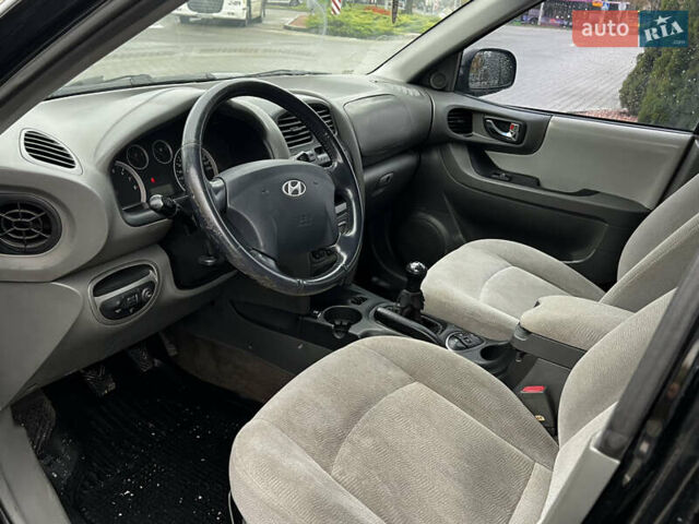 Черный Хендай Санта Фе, объемом двигателя 2 л и пробегом 270 тыс. км за 4300 $, фото 9 на Automoto.ua