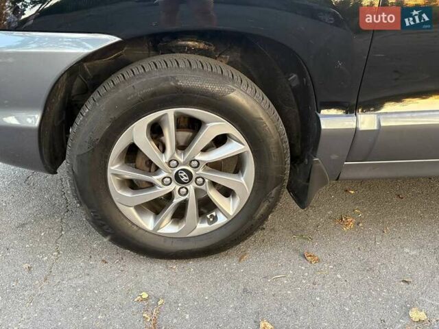 Черный Хендай Санта Фе, объемом двигателя 2.4 л и пробегом 175 тыс. км за 6800 $, фото 23 на Automoto.ua