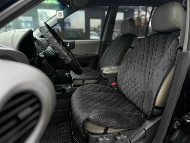 Чорний Хендай Санта Фе, об'ємом двигуна 2.7 л та пробігом 231 тис. км за 6490 $, фото 10 на Automoto.ua