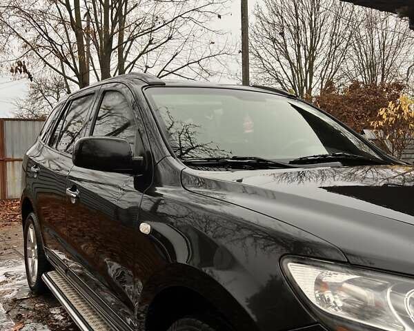 Черный Хендай Санта Фе, объемом двигателя 2.2 л и пробегом 273 тыс. км за 10000 $, фото 1 на Automoto.ua