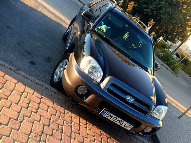 Чорний Хендай Санта Фе, об'ємом двигуна 2 л та пробігом 317 тис. км за 6900 $, фото 2 на Automoto.ua