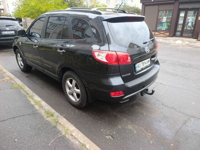Черный Хендай Санта Фе, объемом двигателя 2.7 л и пробегом 295 тыс. км за 8700 $, фото 3 на Automoto.ua