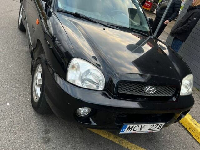 Чорний Хендай Санта Фе, об'ємом двигуна 2 л та пробігом 312 тис. км за 3550 $, фото 1 на Automoto.ua