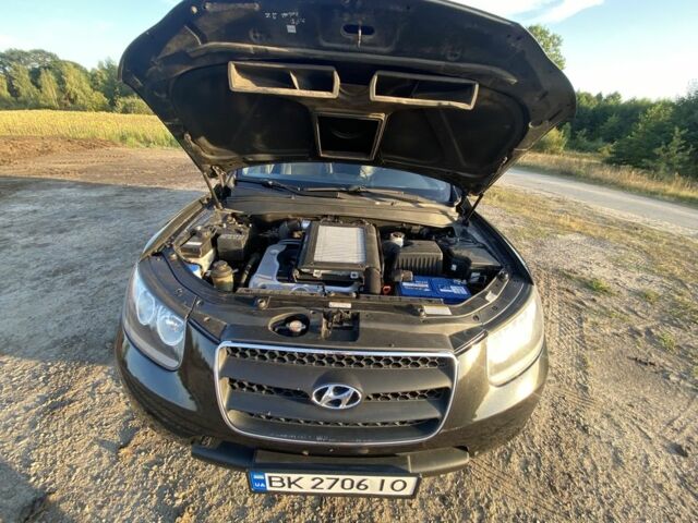 Черный Хендай Санта Фе, объемом двигателя 2.2 л и пробегом 245 тыс. км за 9500 $, фото 3 на Automoto.ua