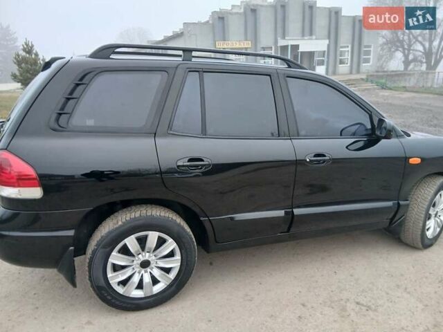 Черный Хендай Санта Фе, объемом двигателя 2.66 л и пробегом 195 тыс. км за 5699 $, фото 19 на Automoto.ua